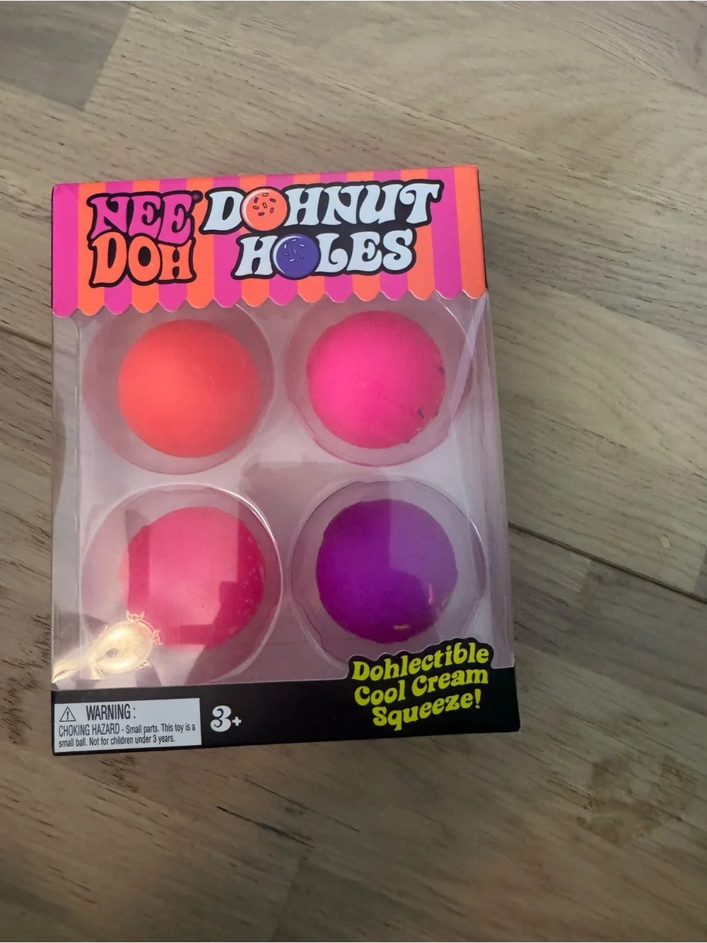 NeeDoh Donut Holes 4-Pack Stress Balls - Pink, Orange, Purple